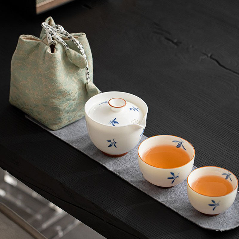 Botanical travel tea set ceramic or glass product photo showing the compact brewer, cups, and carrying case from the CoffeifyMug listing.
