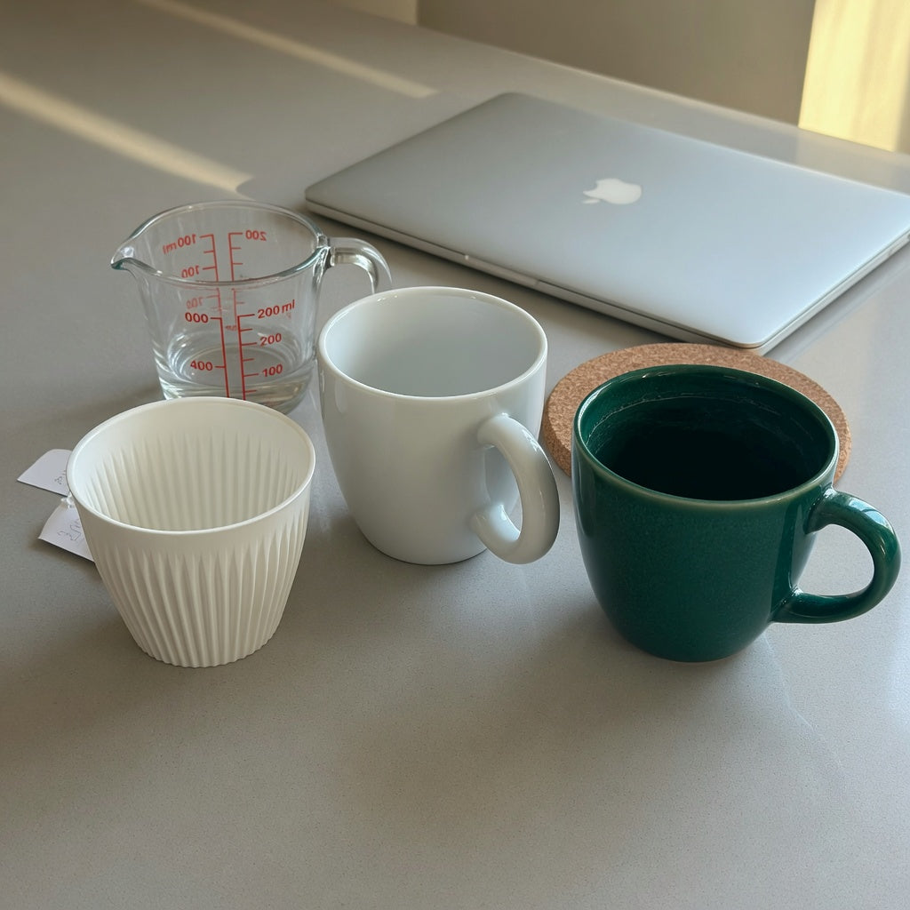 Flat white cup buying priorities shown with 200 ml, 250 ml, and 270 ml cups on a compact coffee counter