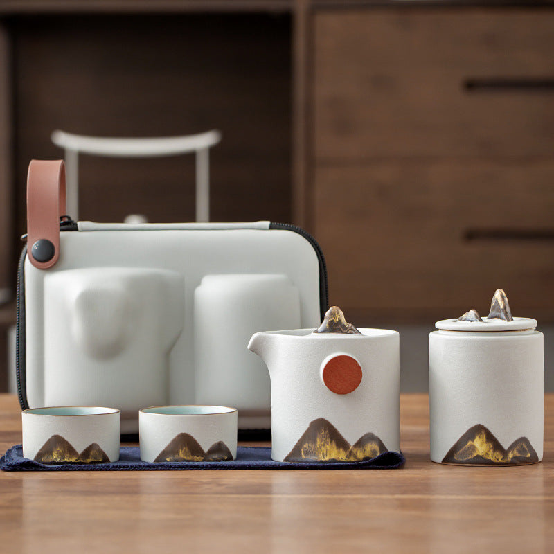 White ceramic travel tea set with Pot, 2 Cups and Canister with carrying case