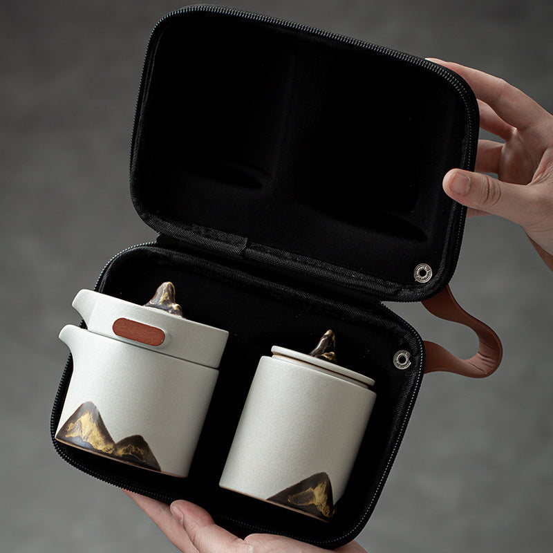 White ceramic travel tea set with Pot, Pitcher, 2 Cups and Canister packed in its fitted case