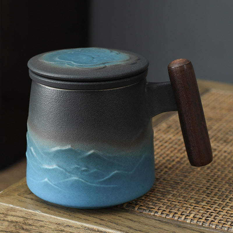 Blue cloud-pattern tea infuser mug with wooden handle