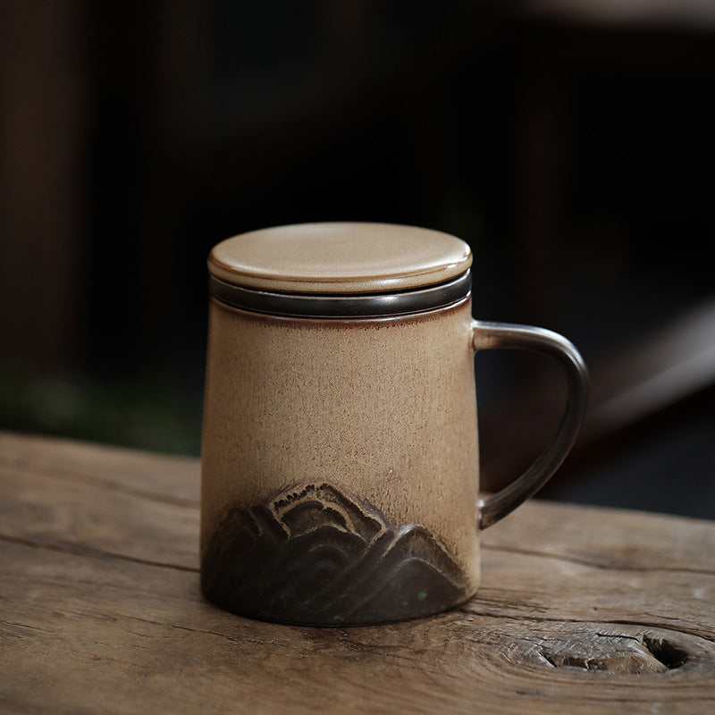 Mountain glaze ceramic tea infuser mug with a ceramic loop handle