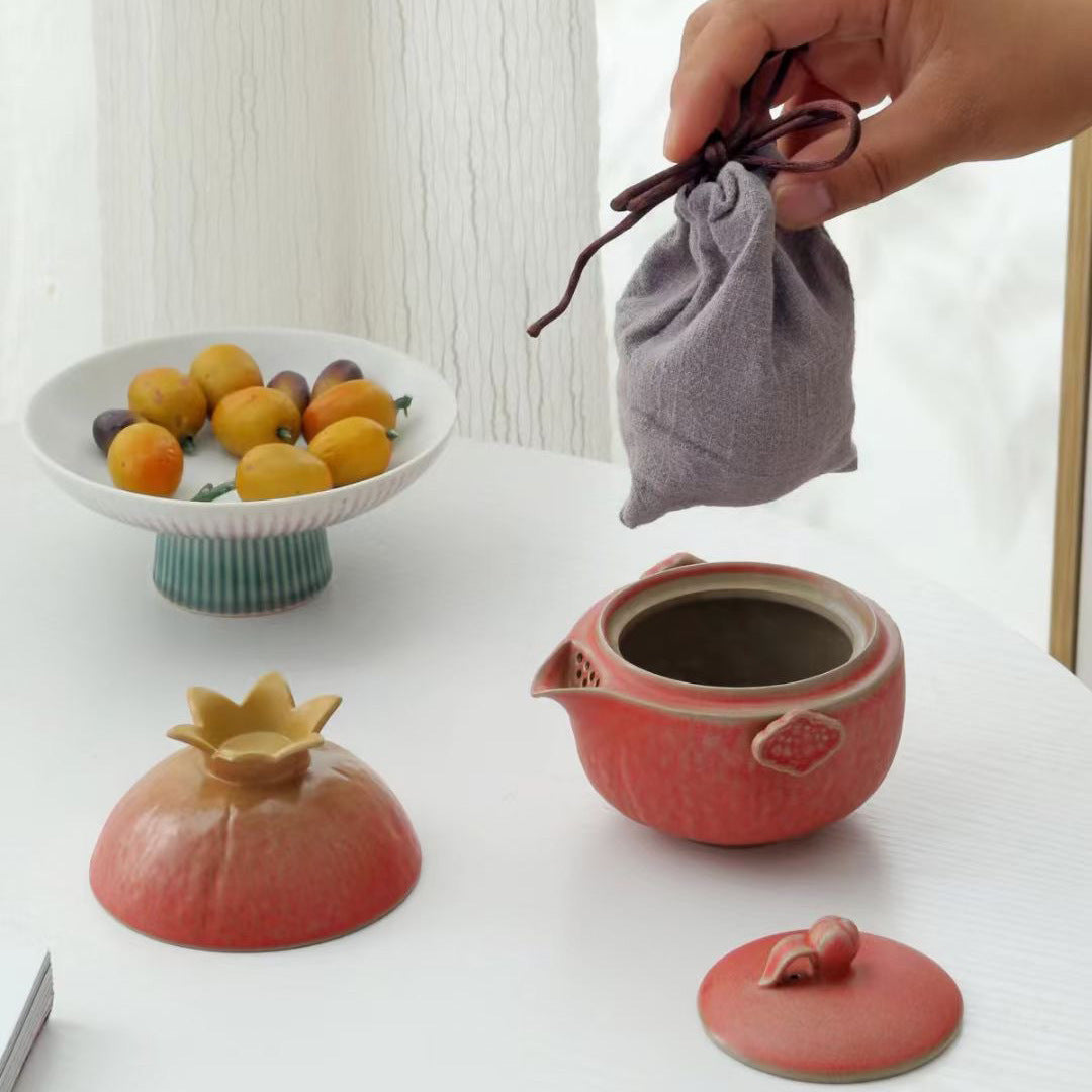 Open pomegranate shaped tea brewer and its nested components