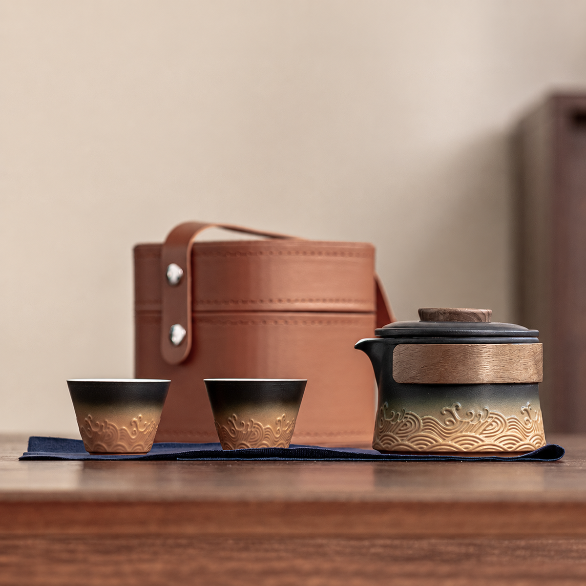 Black and Amber / Brown Carry Case wave relief ceramic travel tea set with two cups