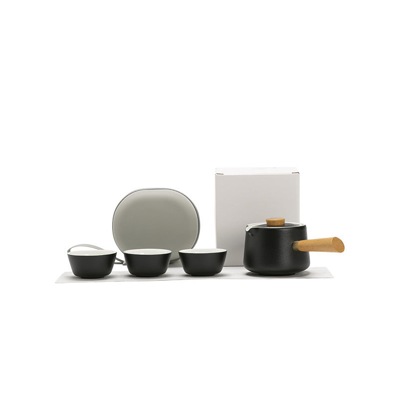Black side-handle ceramic travel tea set with three cups, cloth, round case and plain carton