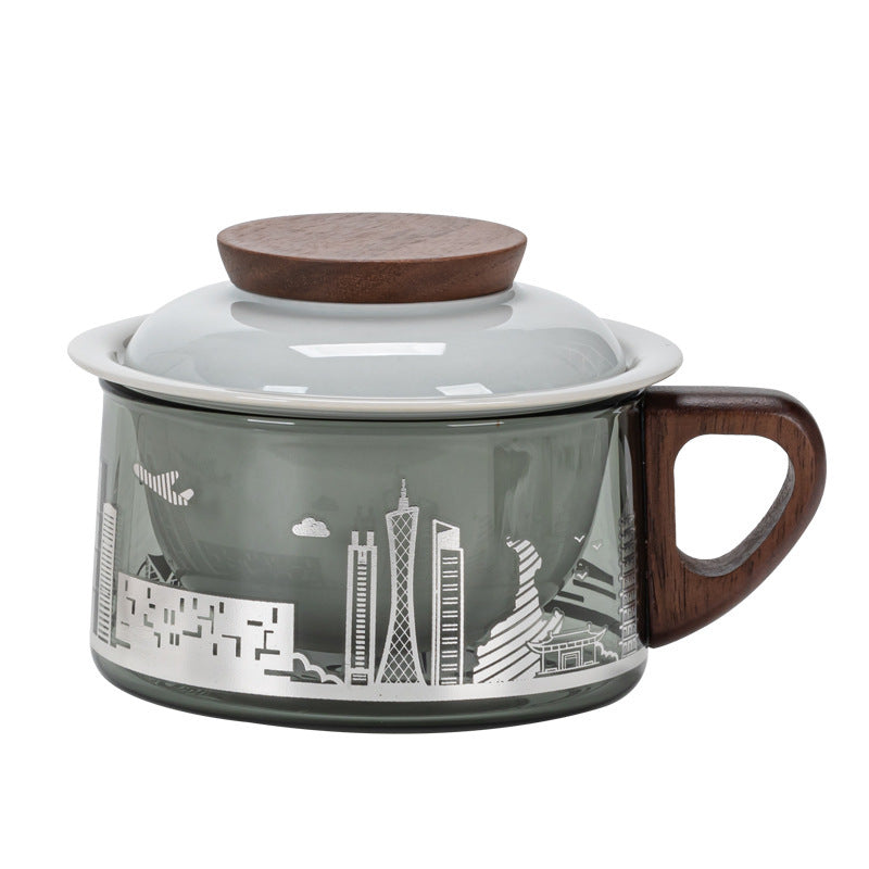 Guangzhou skyline illustration on a smoked glass mug with wood handle and ceramic lid