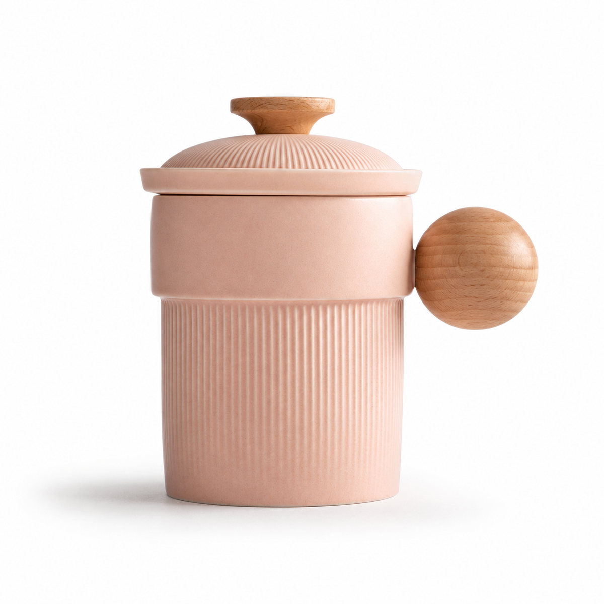 Blush pink ribbed ceramic tea infuser mug with wooden ball handle