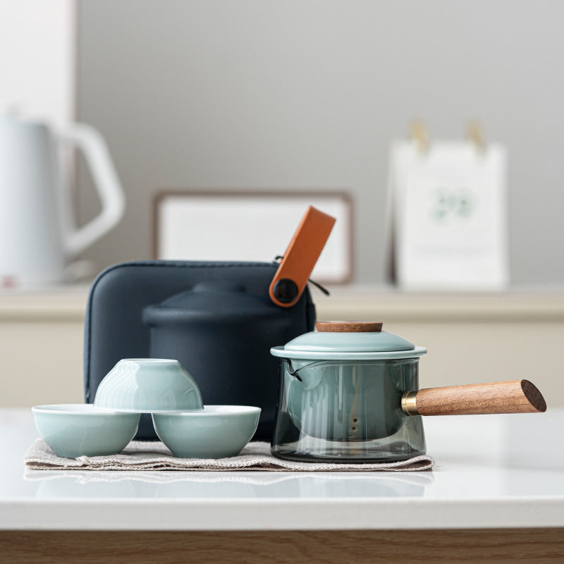 Glass tea brewer and three ceramic cups in celadon / side handle configuration