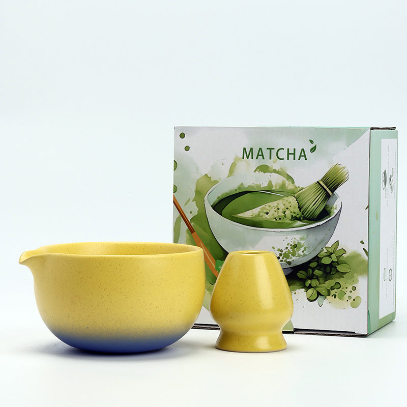 Yellow and Blue ceramic matcha bowl and matching whisk holder with its retail box