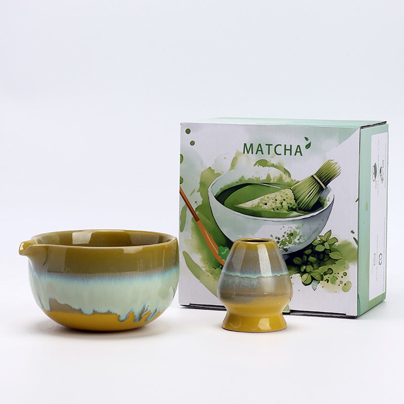 Yellow and Green ceramic matcha bowl and matching whisk holder with its retail box