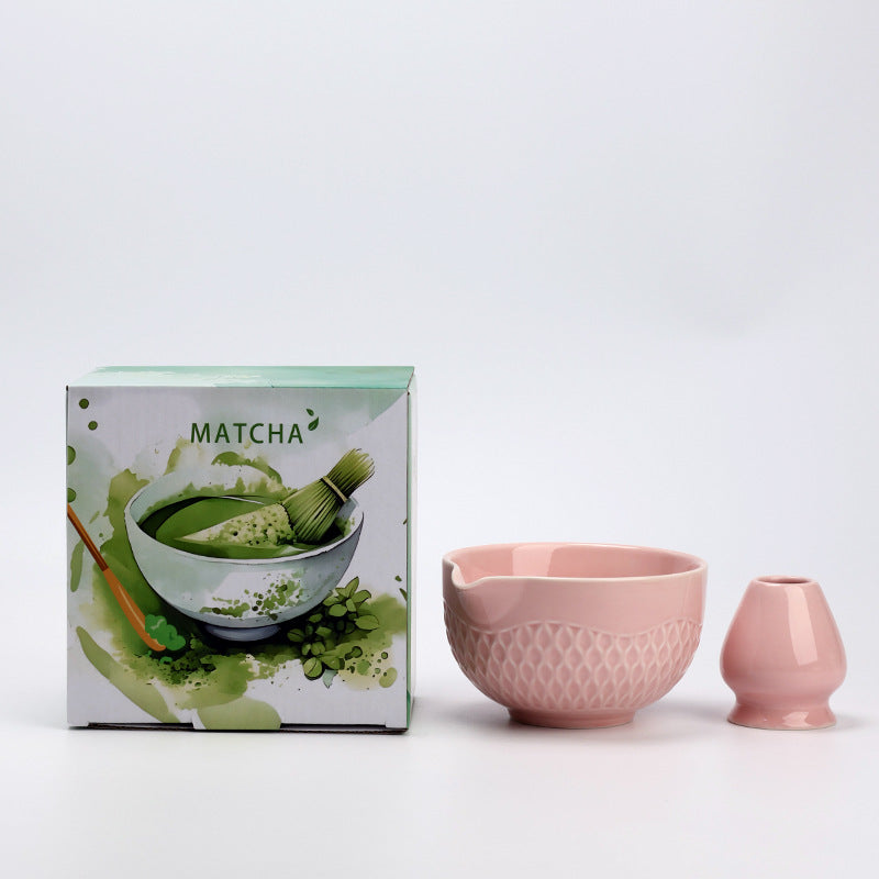 Blossom Pink ceramic matcha bowl and holder with the associated English MATCHA carton