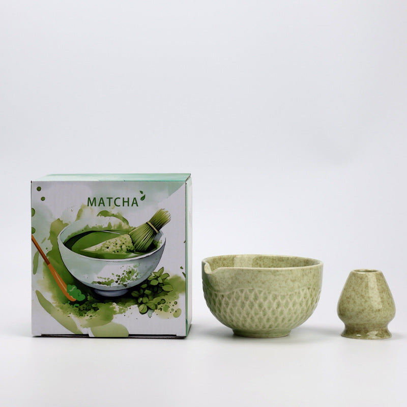 Matcha Green ceramic matcha bowl and holder with the associated English MATCHA carton