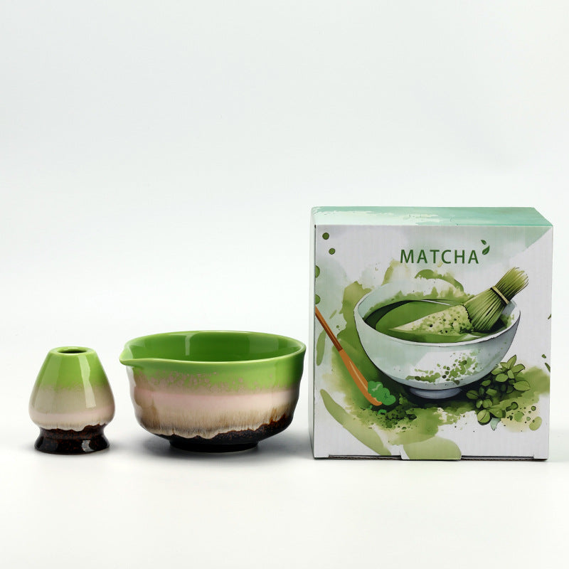 Spring Green Reactive ceramic bowl and coordinating whisk holder beside the associated MATCHA carton