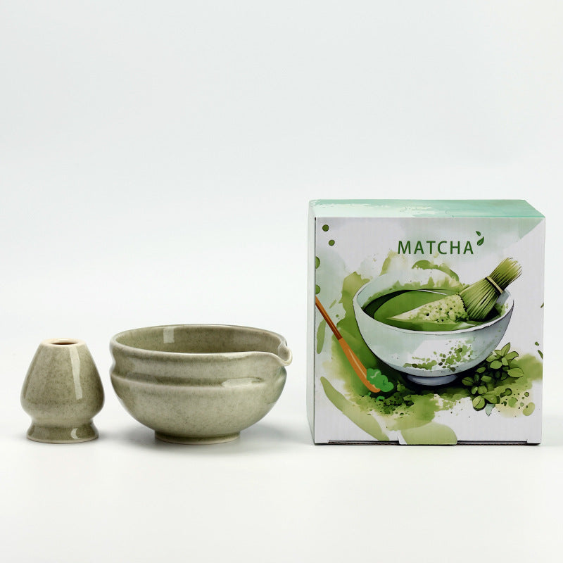 Wide Rings - Matcha Green ceramic bowl and coordinating whisk holder beside the associated MATCHA carton