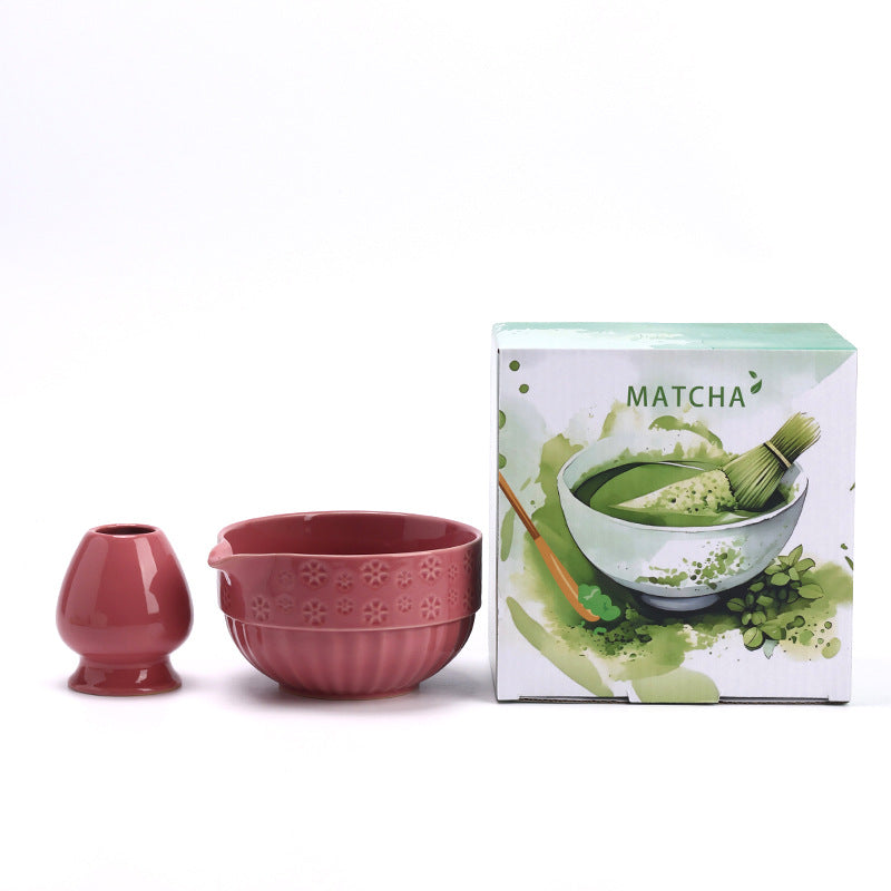 Floral Relief - Rose Pink ceramic bowl and coordinating whisk holder beside the associated MATCHA carton