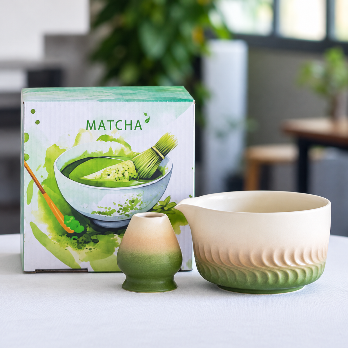 Green gradient relief-pattern matcha bowl and matching ceramic whisk holder with the included MATCHA presentation carton.