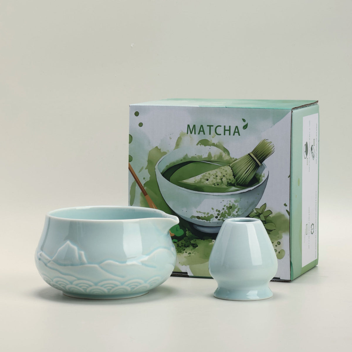 Celadon ceramic matcha bowl and matching whisk holder with its retail box