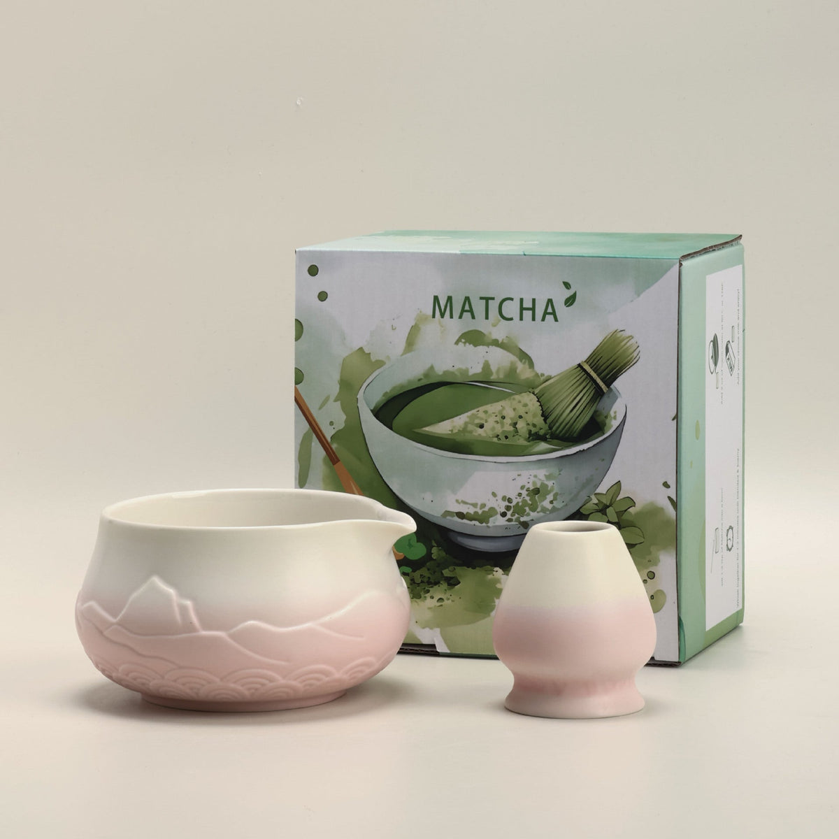 Pink Gradient ceramic matcha bowl and matching whisk holder with its retail box
