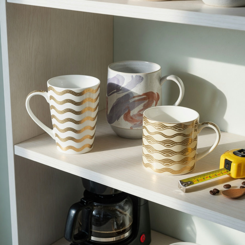 Large decorative coffee mugs everyday mug rotation product shortlist guide showing three options on an open kitchen shelf