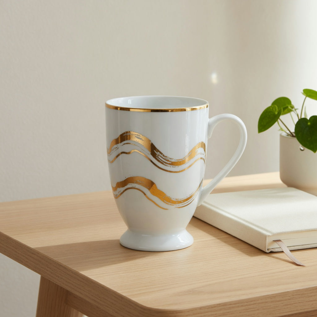 White golden waves tall coffee mug on a pale oak desk beside a notebook