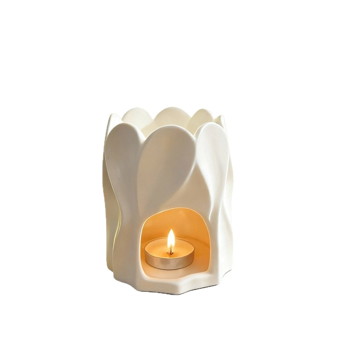 White petal-shaped ceramic aroma burner with a tealight opening