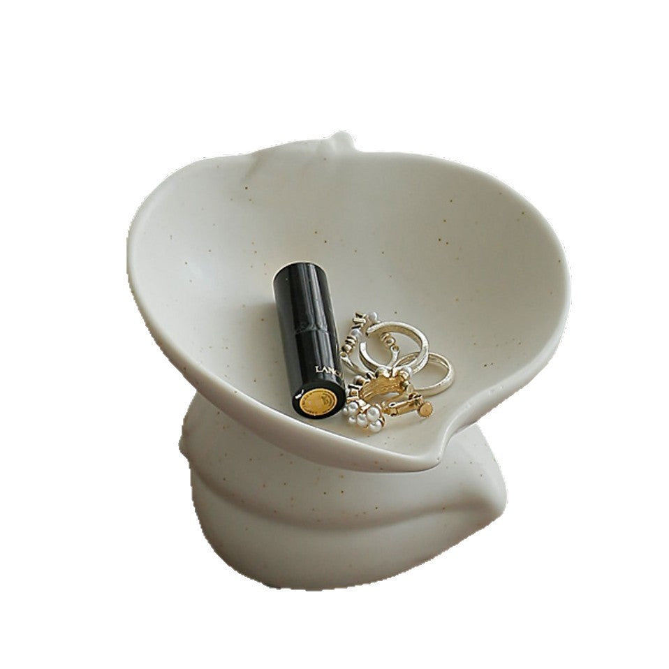 White peach shaped pedestal jewelry bowl