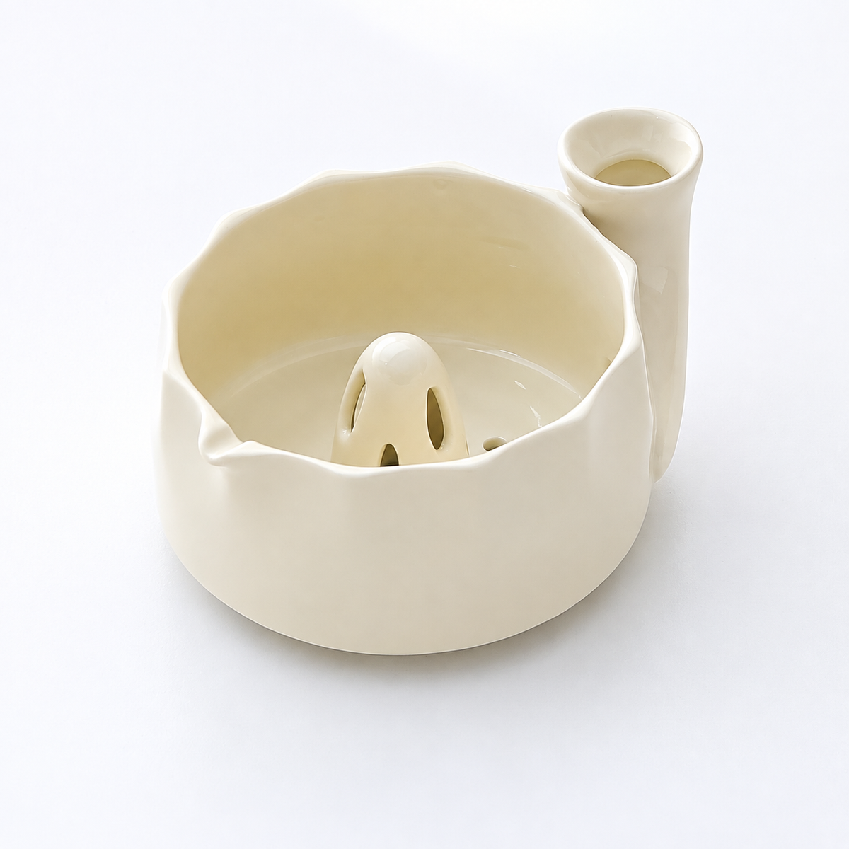 Cream ceramic fruit washing bowl showing the pouring lip, side inlet and raised drain cone