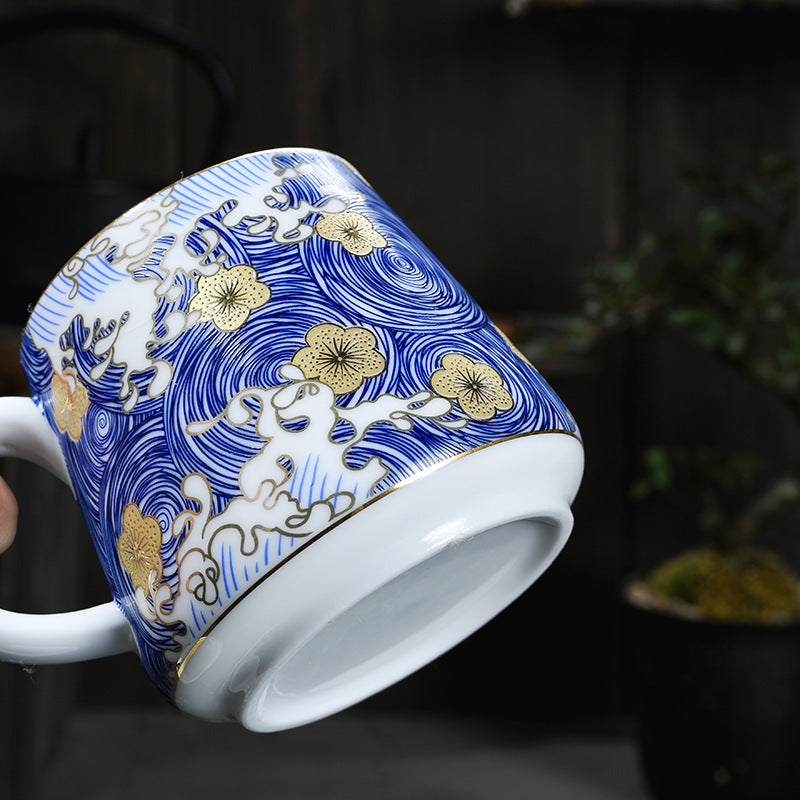 Close-up of the blue wave and gold floral pattern