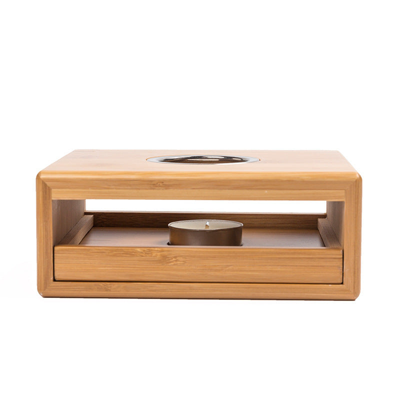 Bamboo tea light teapot warmer with an open front