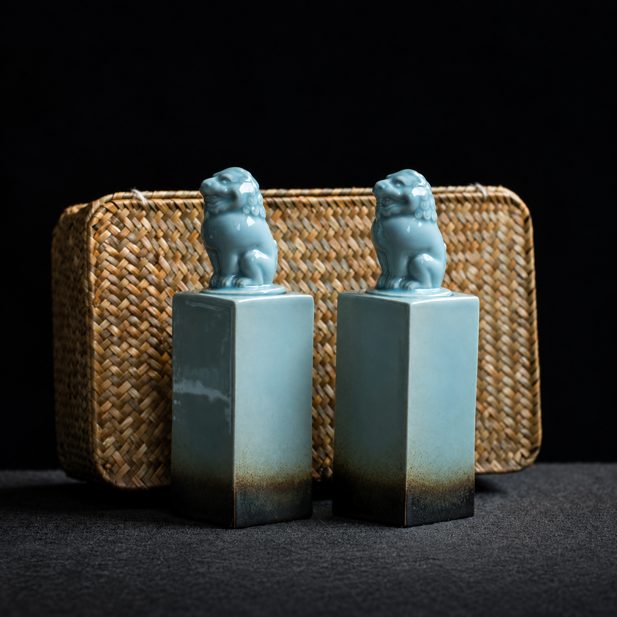 Celadon Lion - Small Pair of ceramic tea canisters with sculpted animal lids and one woven basket