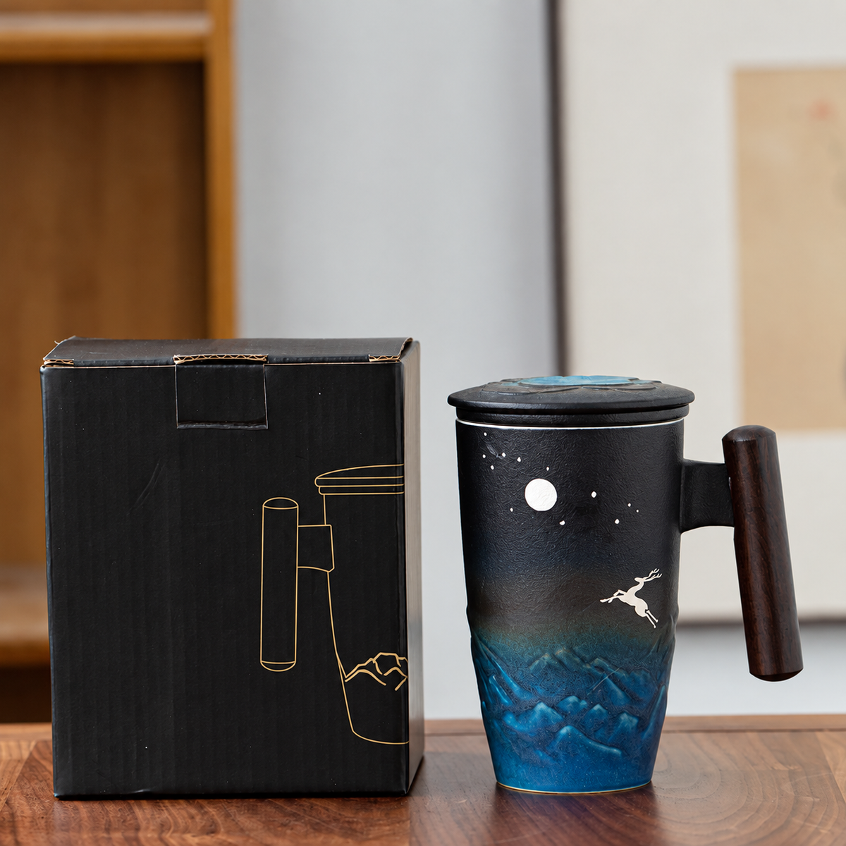 Tall midnight-blue deer and moon ceramic tea mug with wooden handle, lid and ordinary retail box