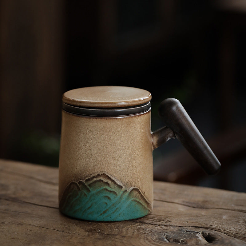 Mountain glaze ceramic tea infuser mug with a wooden handle and lid
