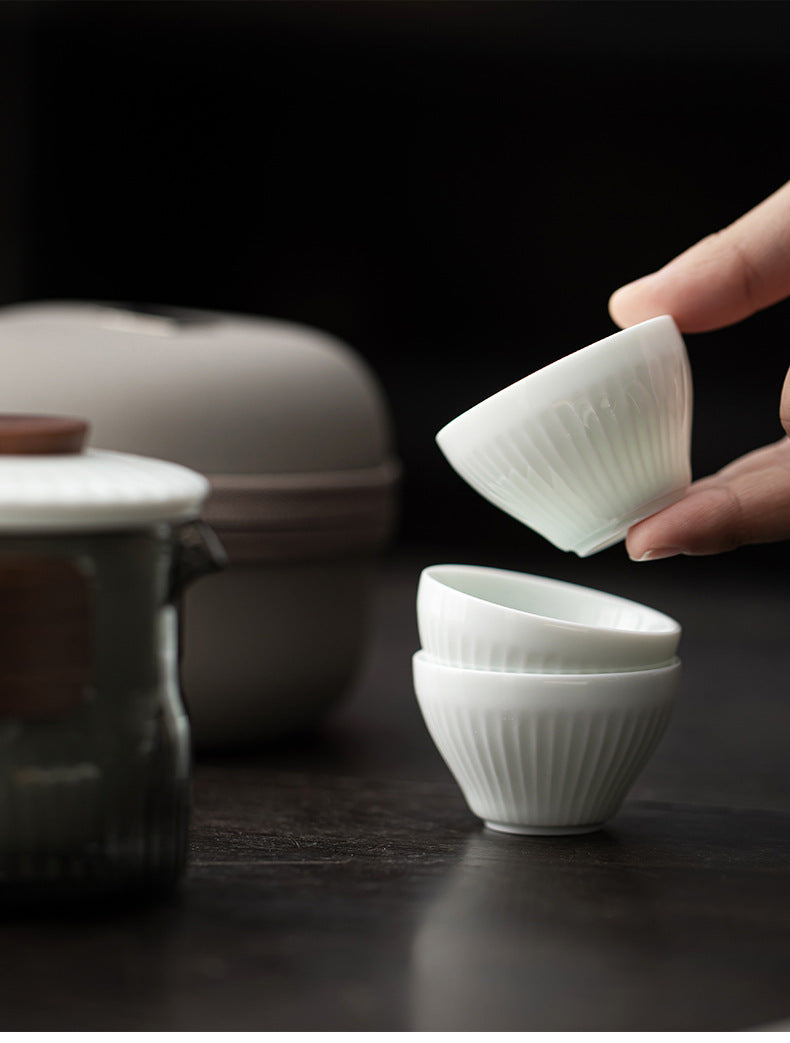 Close view of the three white fluted ceramic tasting cups