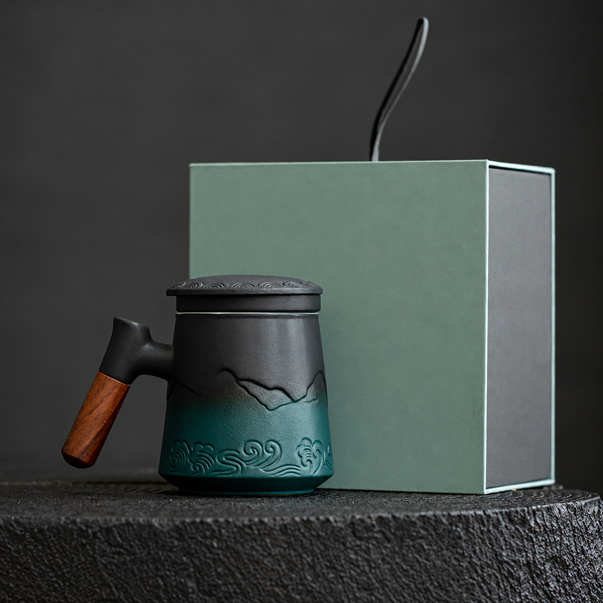 Green / Cresting Waves ceramic tea infuser mug with a wooden grip and plain fitted presentation box