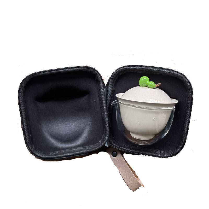 Gourd lid tea set nested inside its zipped travel case