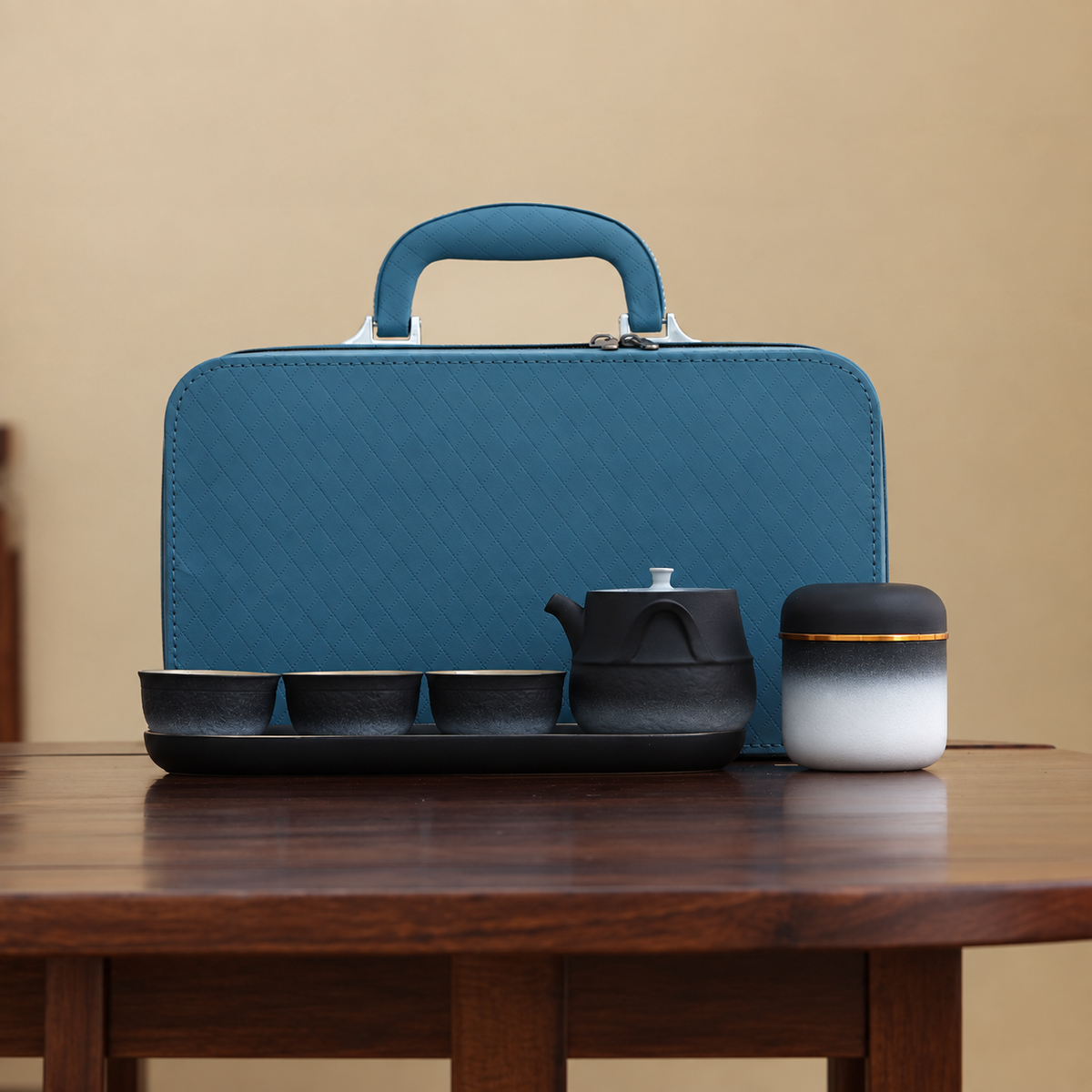 White-gradient ceramic travel tea set with three cups, tray, jar and teal carrying case