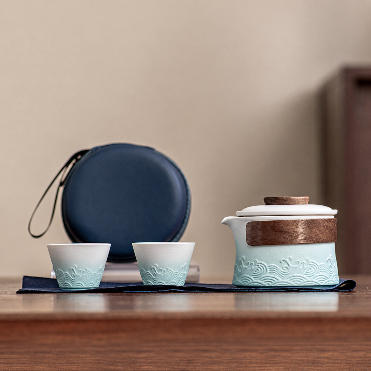 White and Mint / Navy Zip Case wave relief ceramic travel tea set with two cups