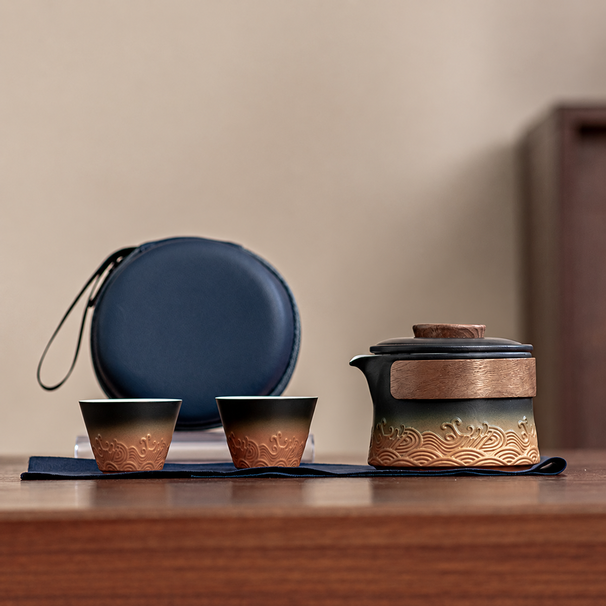 Black and Amber / Navy Zip Case wave relief ceramic travel tea set with two cups