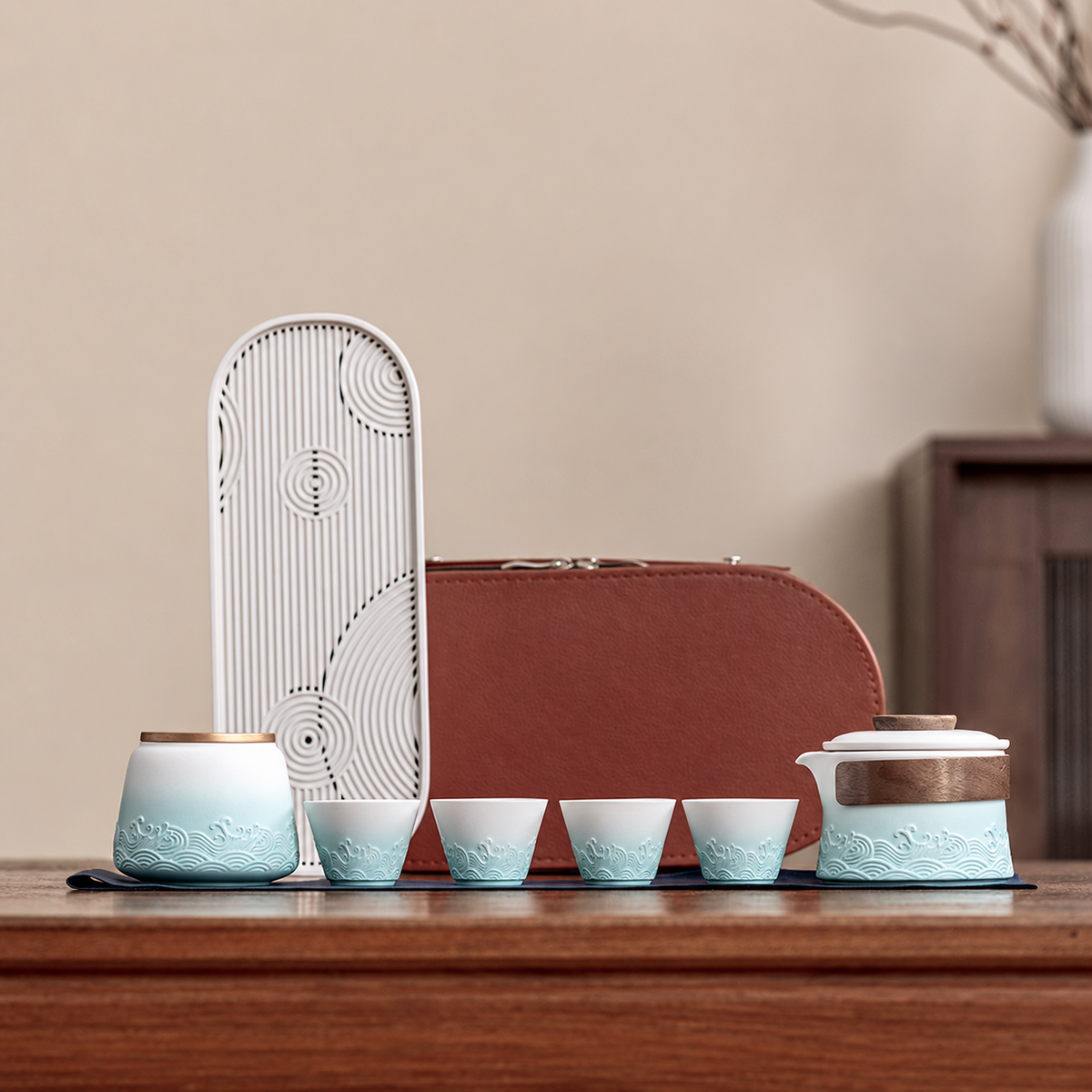 White and Mint wave relief travel tea set with four cups and tea canister