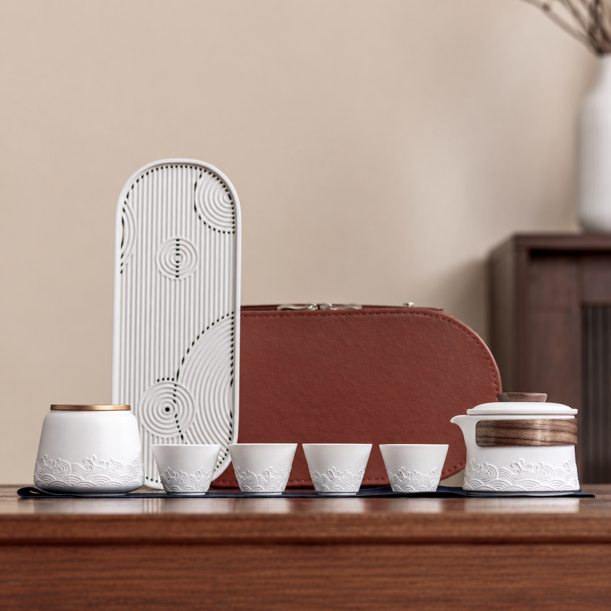 White wave relief travel tea set with four cups and tea canister