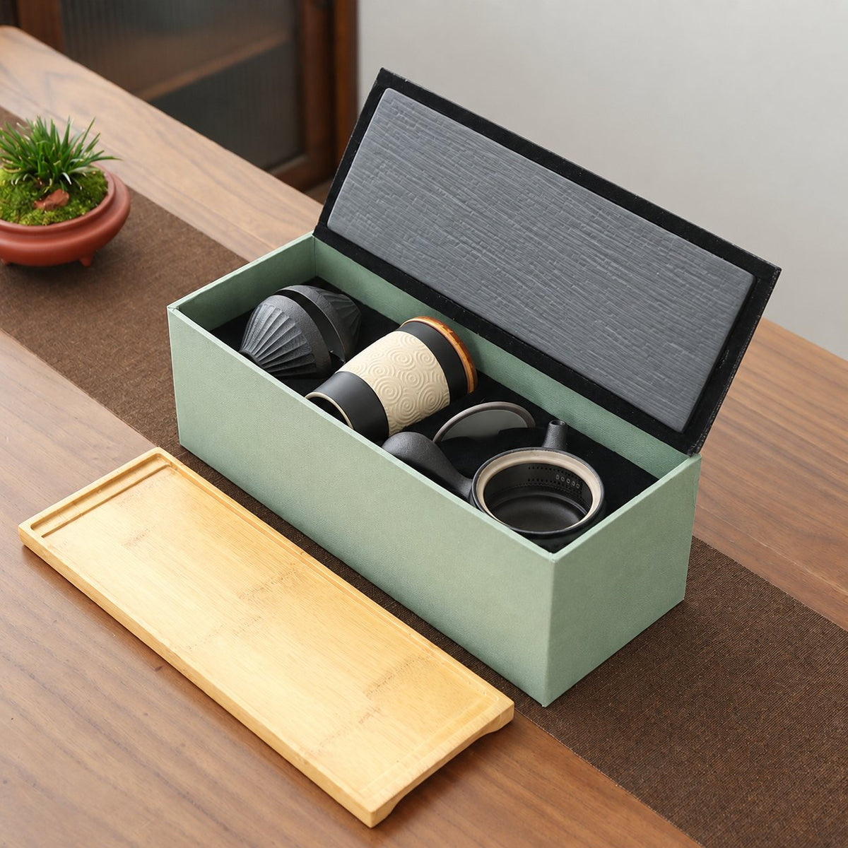 Tea set components fitted inside the presentation box