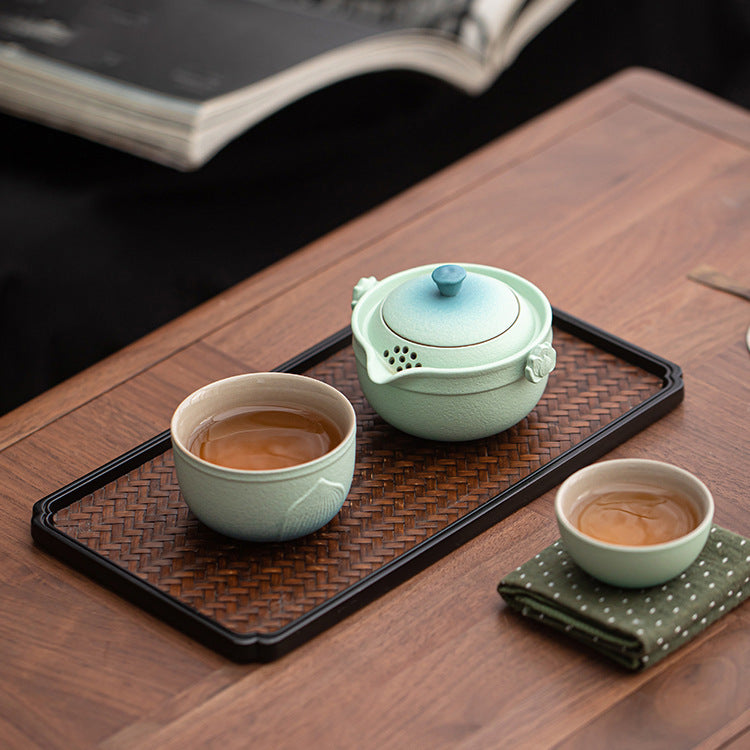 Lotus ceramic tea set arranged for serving tea