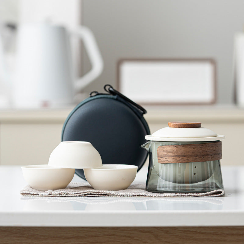 Glass tea brewer and three ceramic cups in cream / round case configuration