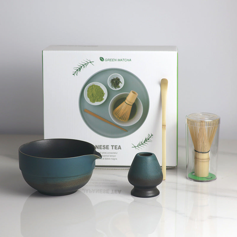 Blue and Black - 4 Pieces matcha set showing the bowl, holder, whisk, scoop and actual retail box