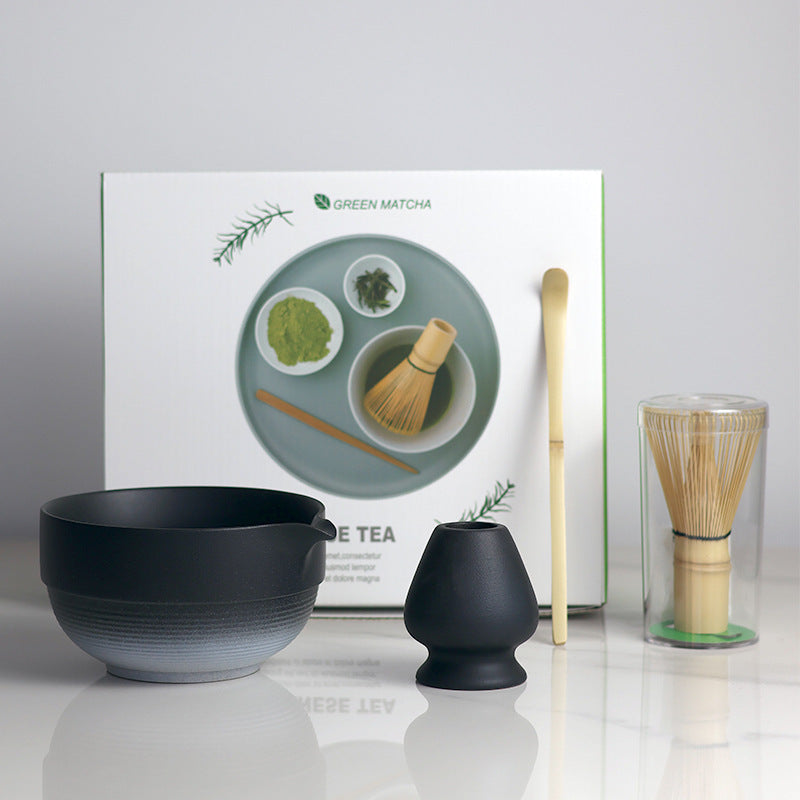 Black and White - 4 Pieces matcha set showing the bowl, holder, whisk, scoop and actual retail box