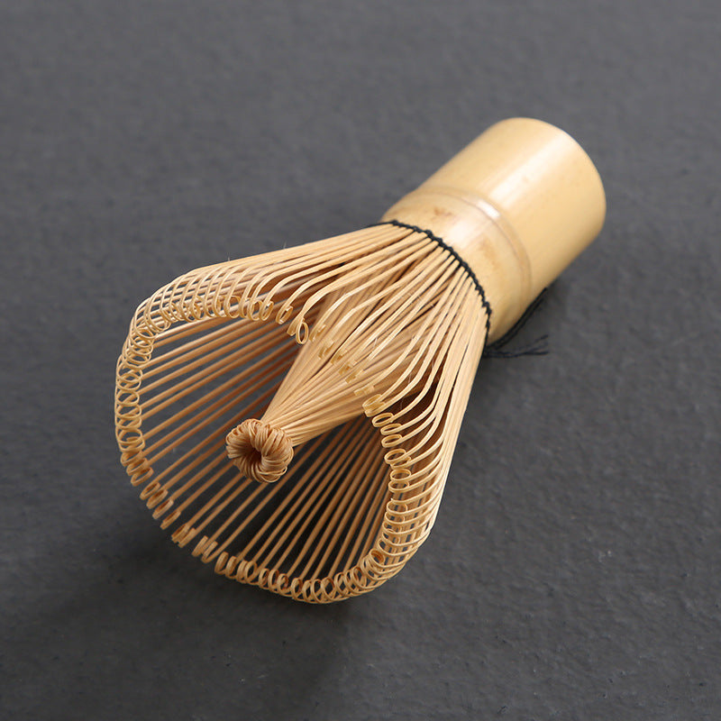 Close view of bamboo whisk tines and thread binding