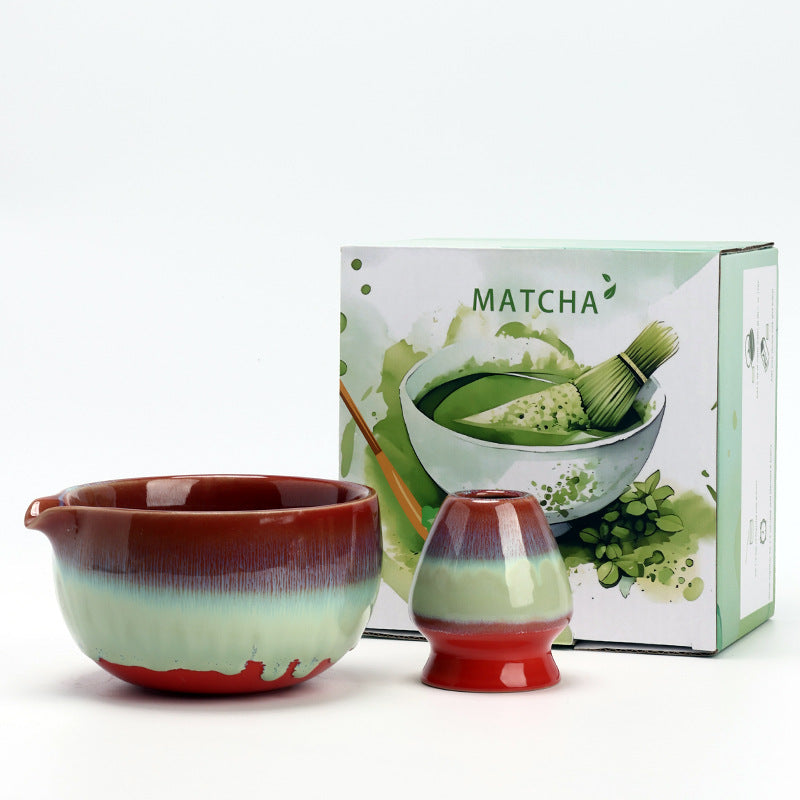 Red and Green ceramic matcha bowl and matching whisk holder with its retail box
