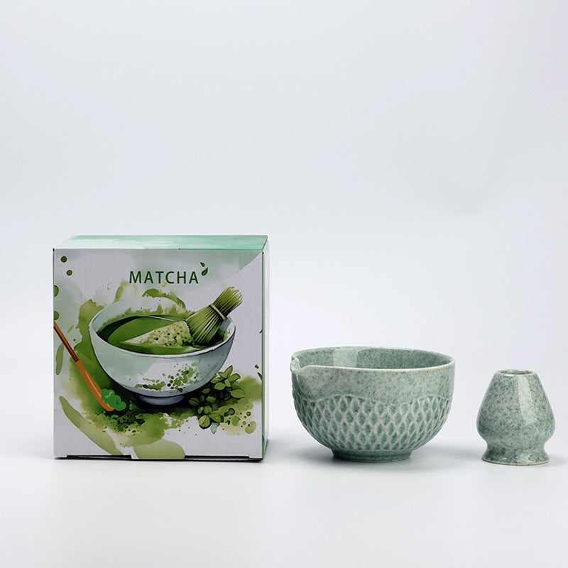 Speckled Blue ceramic matcha bowl and holder with the associated English MATCHA carton