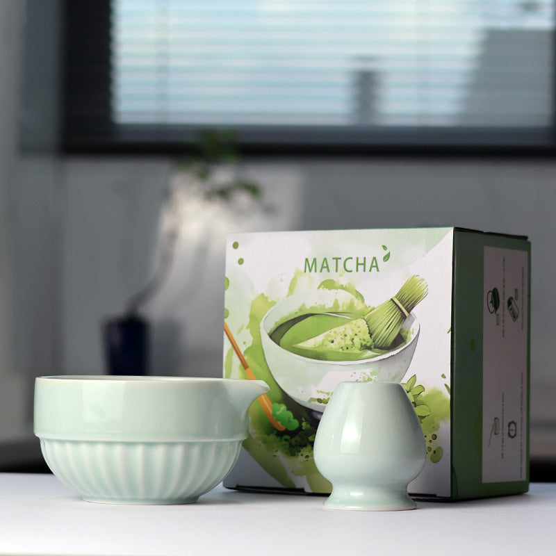 Fluted Bowl - Pale Celadon ceramic bowl and coordinating whisk holder beside the associated MATCHA carton