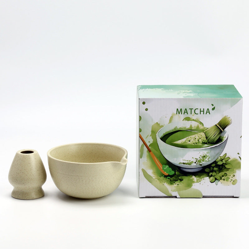 Chattered Texture - Cream ceramic bowl and coordinating whisk holder beside the associated MATCHA carton
